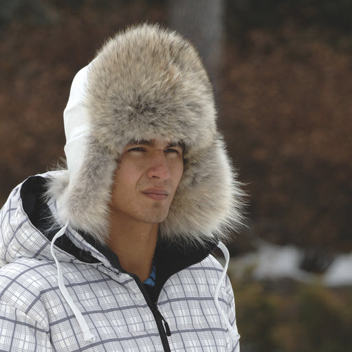 Coyote Fur Winter Hat Aviator with White Leather on Man in the woods